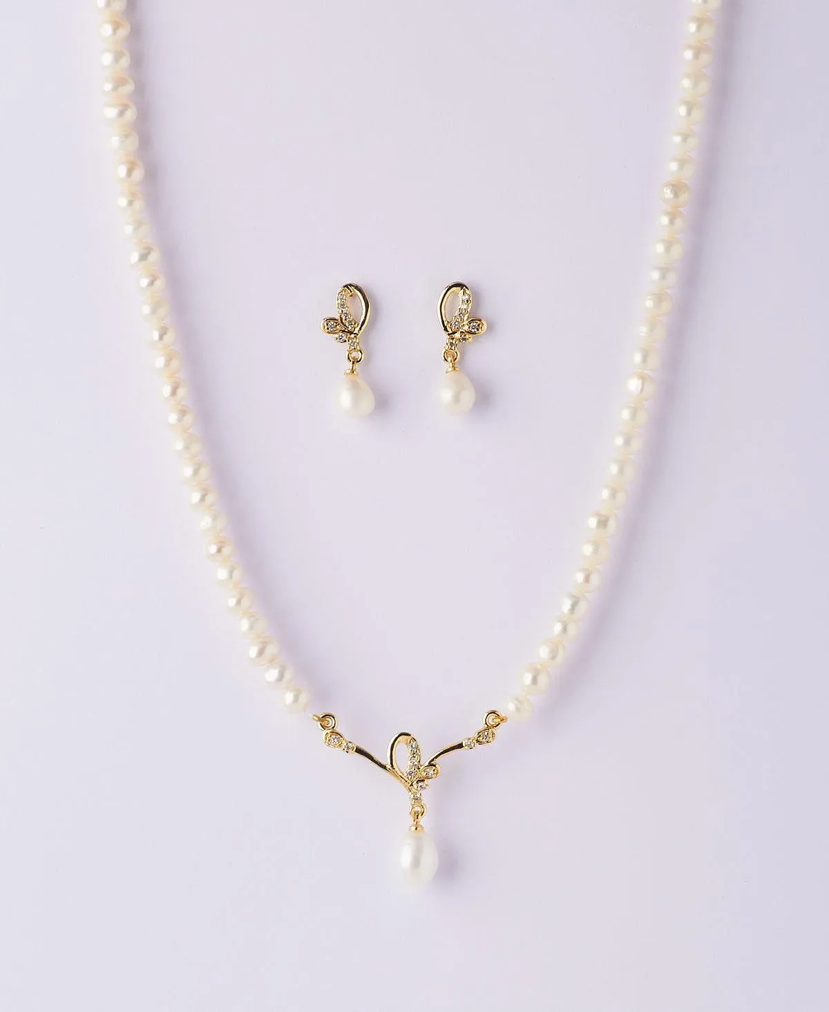 Beautiful Stone Studded Pearl Necklace Set