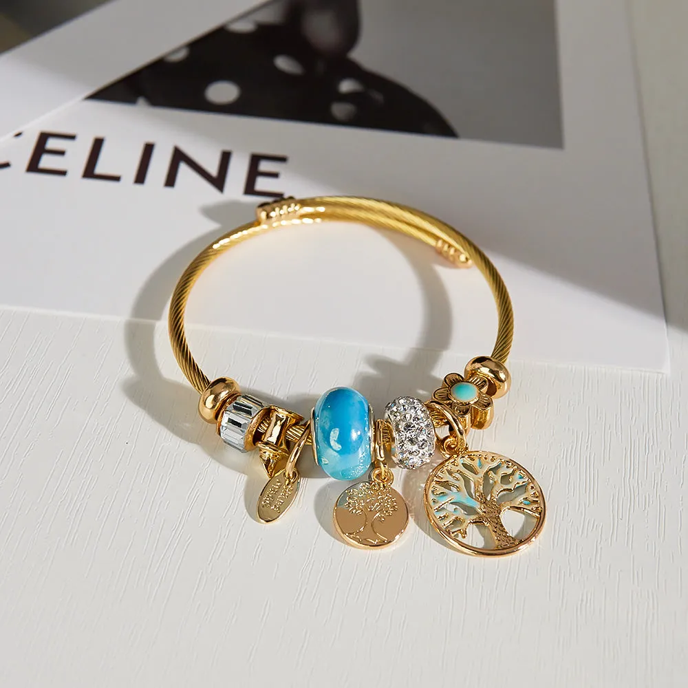 Gold Charm Bracelet for Women with Blue Beads and Tree of Life Charms - Elegant and Stylish Jewelry for Any Occasion